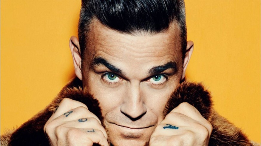 Robbie Williams et Black Eyed Peas au concert de charité de Manchester